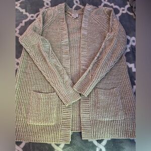 beige cardigan from the brand St. John’s Bay